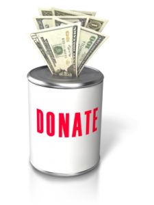 Donation can with money being placed in it.